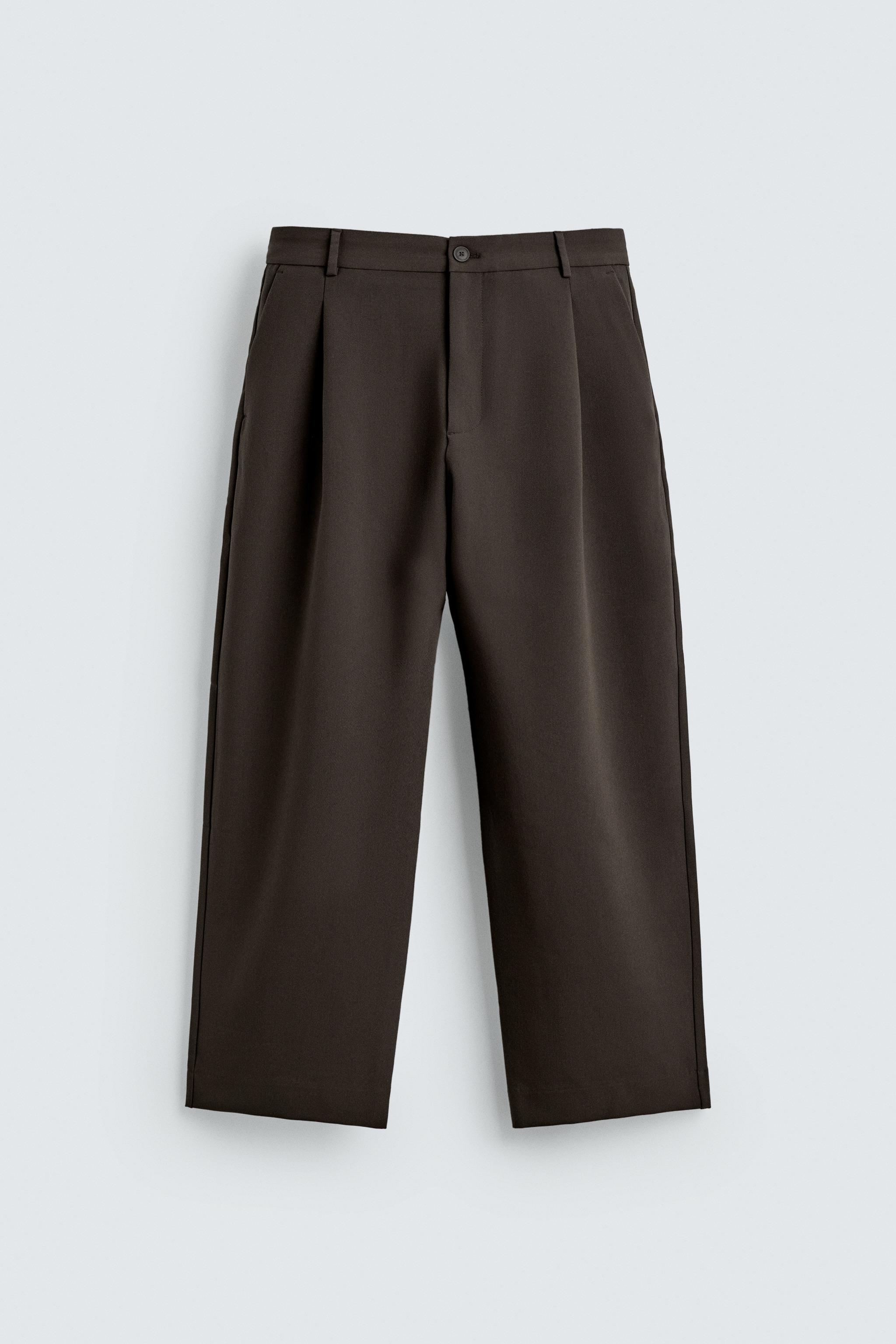 RELAXED FIT PLEATED PANTS